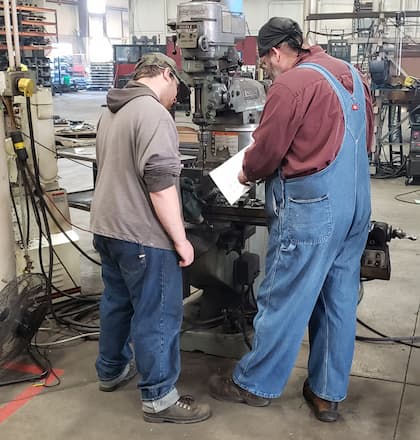 Hy-Brid Lifts employee trains GPS student as general laborer in West Bend facility