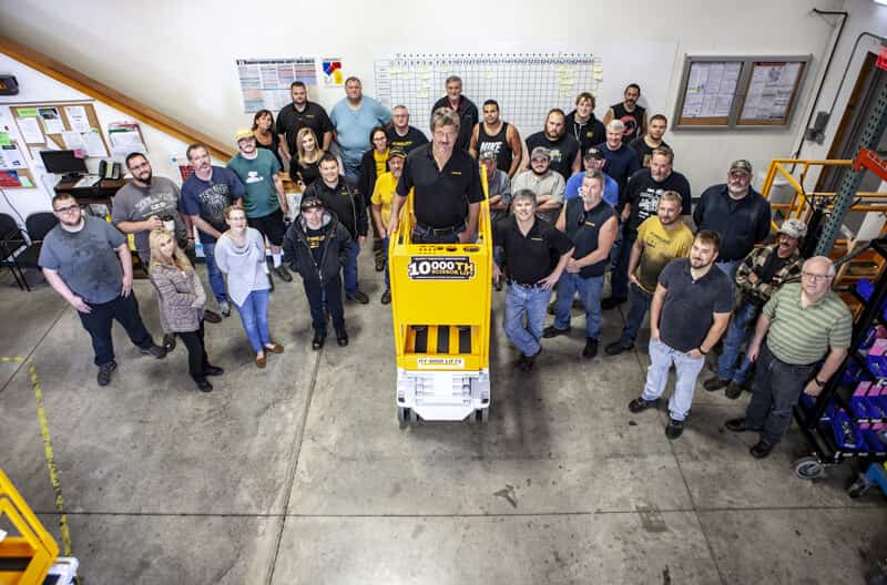 Hy-Brid team poses with their milestone 10,000th lift